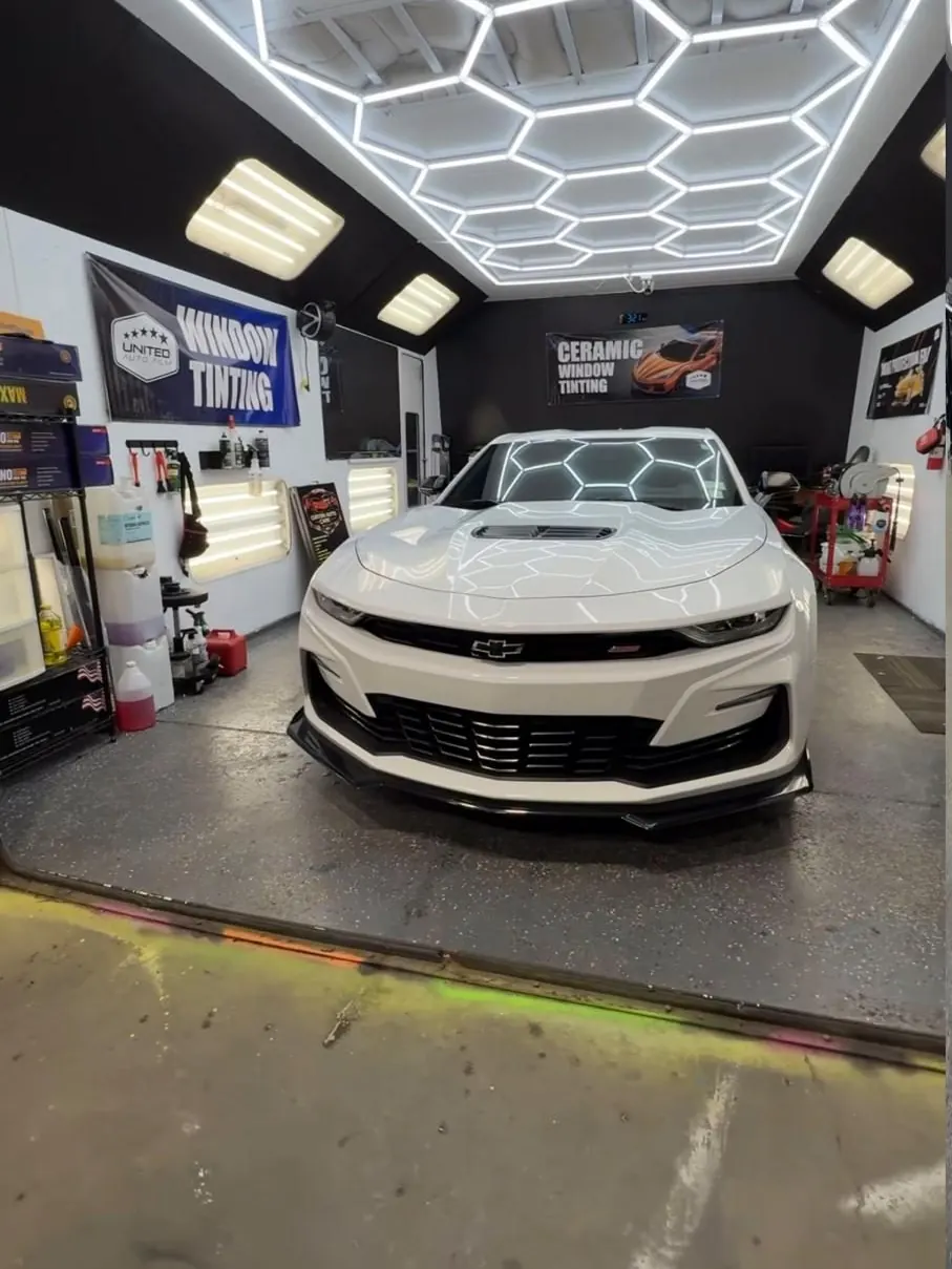 A Chevrolet Camaro with a hexagon ceramic coating pattern beading on the paint