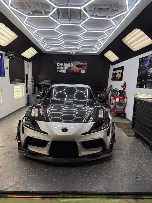 Toyota Supra with hexagon window tint pattern